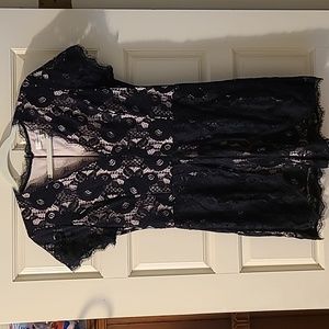 Francesca Size Large black-and-tan lace rompers. Short sleeve